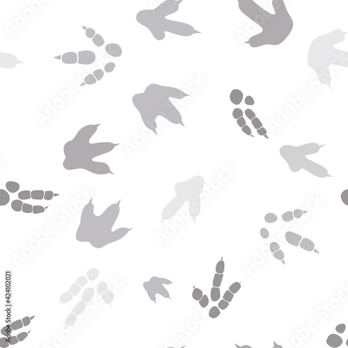 Dinosaur footprint tracks. Minimal color seamless pattern. Background with paw, claw predator. Dinosaur footprint seamless pattern perfect for textile, wrap and wallpaper and design.