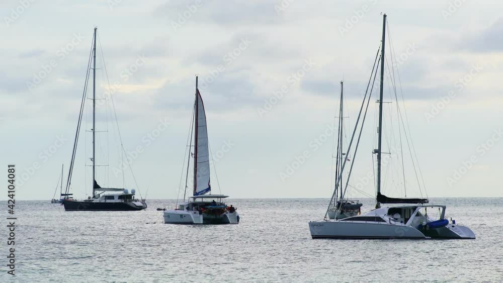 Yacht boat sailing boats or Travel boats in Beautiful open sea at sunset sky Amazing for summer holiday background and Travel destination or Website Yacht boat sailing boats or Travel boats in Beautiful open sea at sunset sky Amazing for summer holiday background and Travel destination or Website