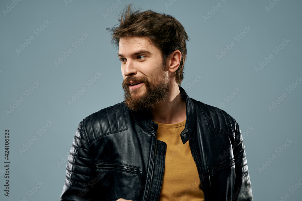 Fototapeta premium cute bearded man musician leather jacket attractive look lifestyle