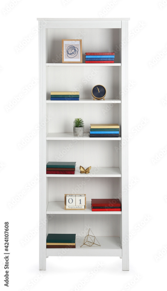 Modern shelf unit with books and decor on white background Modern shelf unit with books and decor on white background