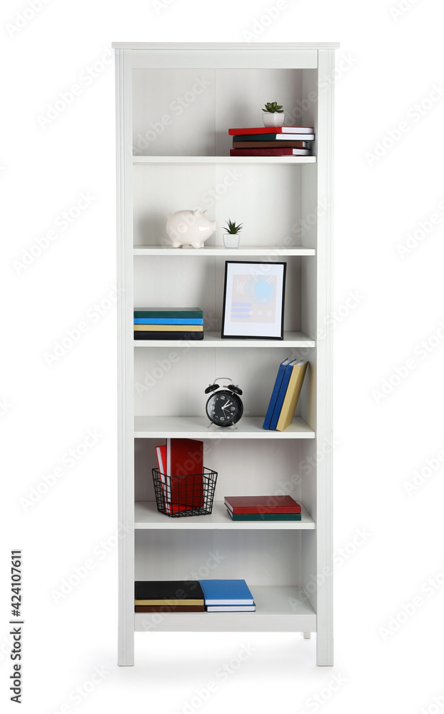 Modern shelf unit with books and decor on white background Modern shelf unit with books and decor on white background