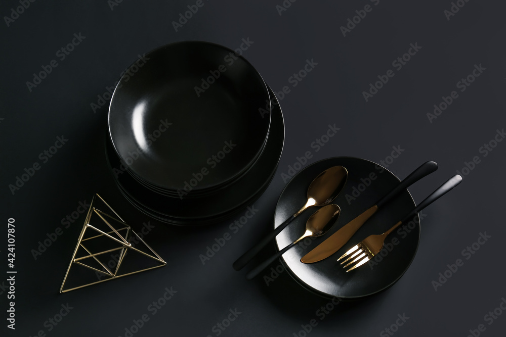 Stylish table setting on dark background