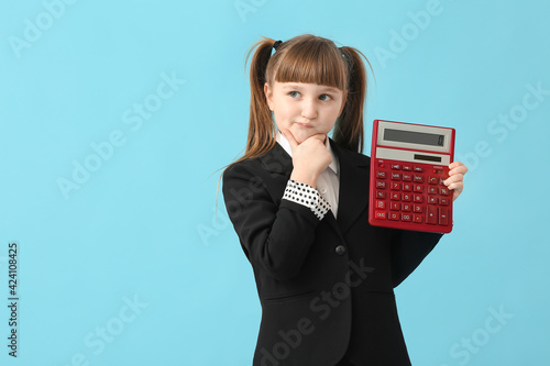 Thoughtful little schoolgir...