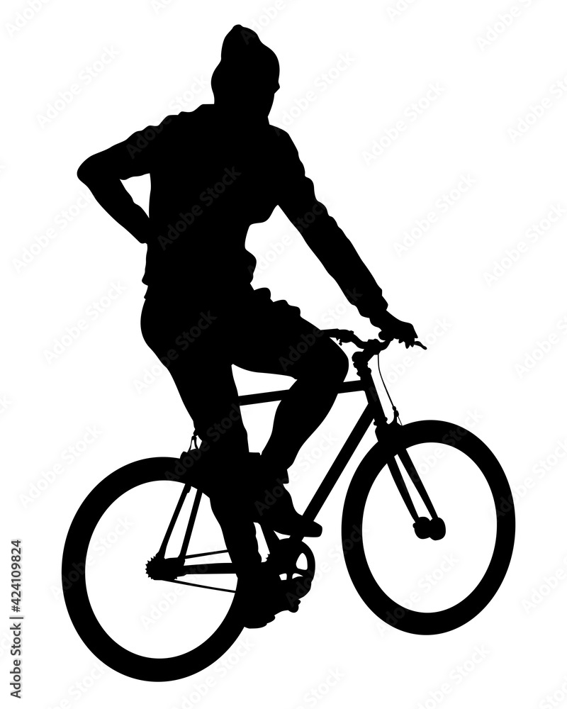 Obraz premium Young athlete on a bike for extreme stunts. Isolated silhouette on a white background