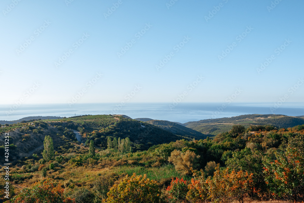 The landscape of mountains and sea on autumn day
