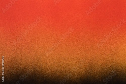 black and red spray paint on a yellow colored paper background