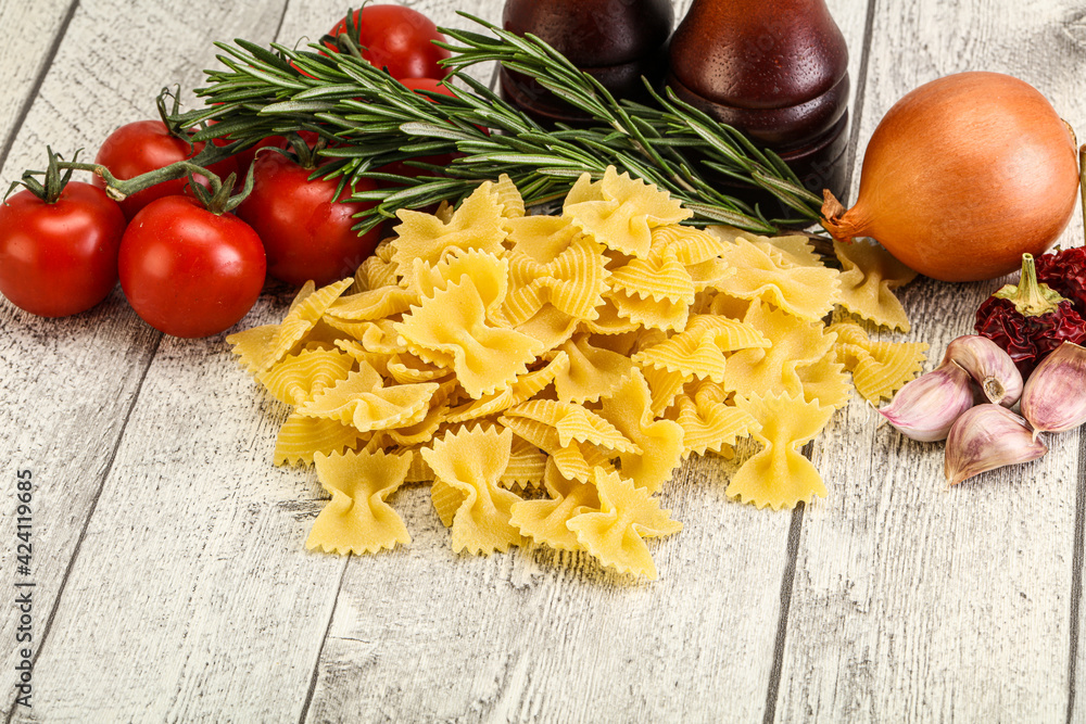 Raw Italian farfalle pasta for cooking Raw Italian farfalle pasta for cooking