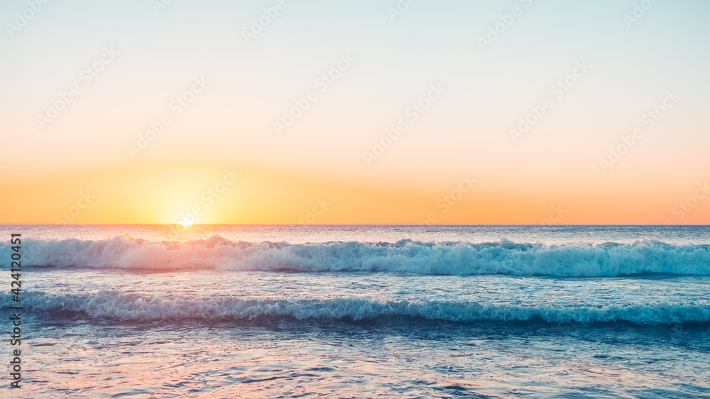 Waves crashing at sunset, Moana Beach, South Australia