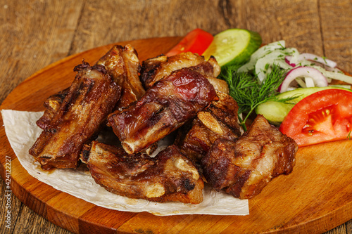 Grilled pork ribs barbeque with vegetables