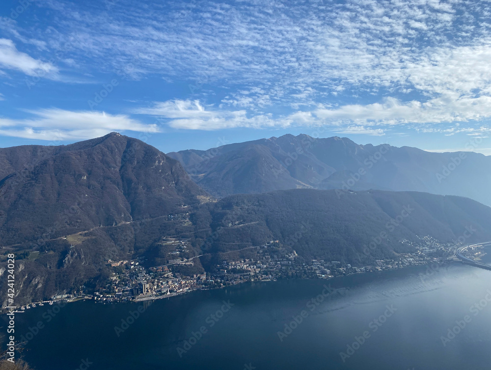 View from Mount San Salvatore. View of the mountains, Lake Lugano and Campione di Italy. Switzerland