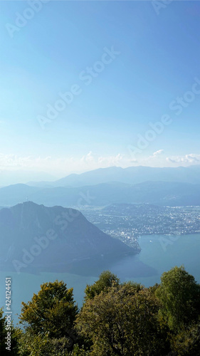 View from Mount San Salvatore. View of the mountains, Lake Lugano and Campione di Italy. Switzerland