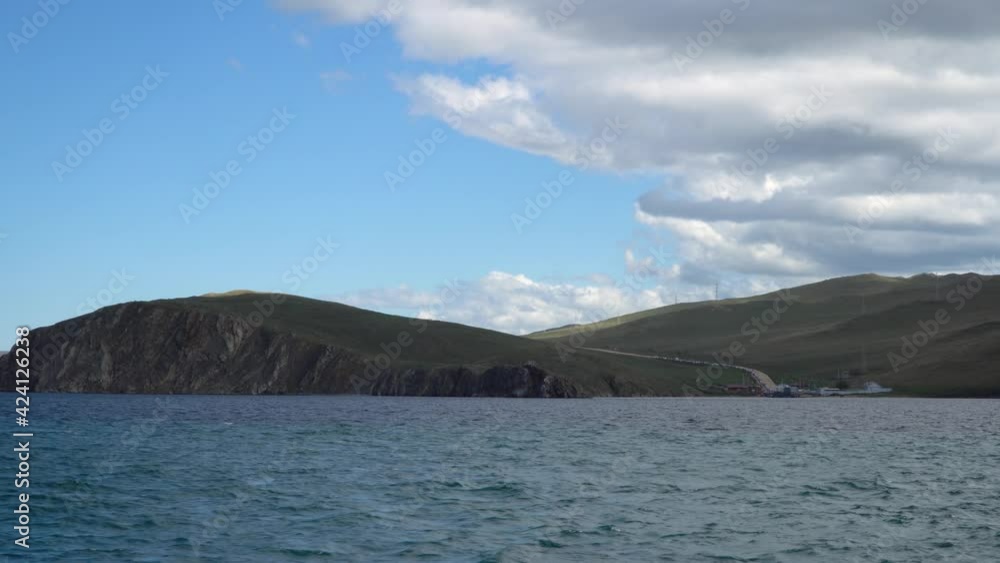 Beautiful landscape of Siberian Baikal Lake. concept of travel. Lake Baikal is the largest freshwater lake in the world. Natural background. Beautiful landscape of Siberian Baikal Lake. concept of travel. Lake Baikal is the largest freshwater lake in the world. Natural background.
