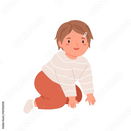 Happy smiling girl crawling. Portrait of kid in home clothes. Little child mo...