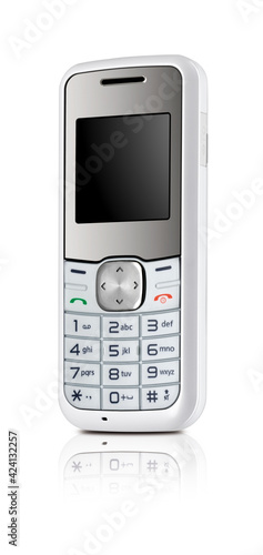 telefono, celular antiguo plateado sobre fondo blanco. Vintage. telephone, silver old cell phone on white background. Vintage.