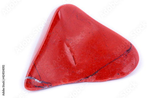 macro red jasper stone, close-up on a white background