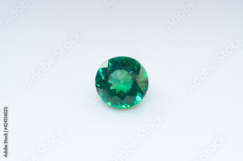 Natural gemstone green sapphire on white background