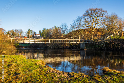 Boat Weil Wooden Suspension Bridge reflecting over the Water of Ken, Scotland