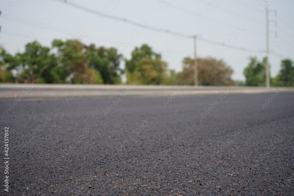 The blur of the asphalt road