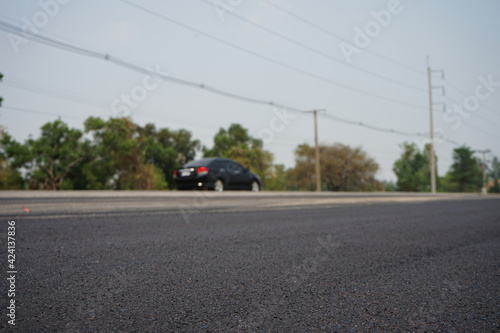 The blur of the asphalt road