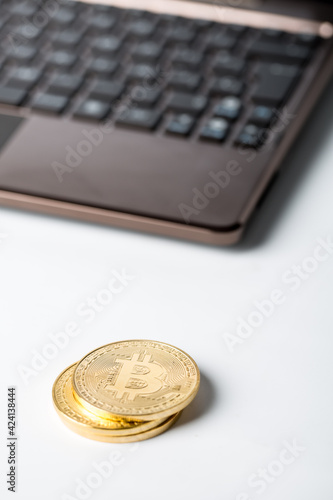 Bitcoin with laptop