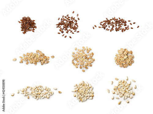 Dry raw unpeeled flax seeds, oat flakes and milk thistle seeds