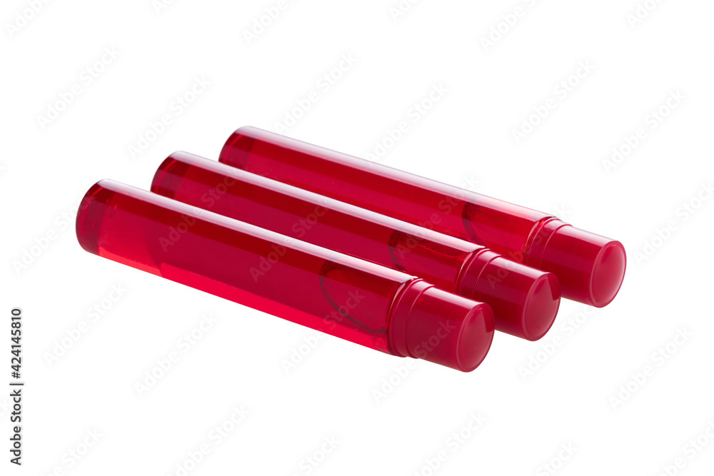Red transparent ampoules with liquid collagen for facial care isolated on white background with clipping path. Skin care products Red transparent ampoules with liquid collagen for facial care isolated on white background with clipping path. Skin care products