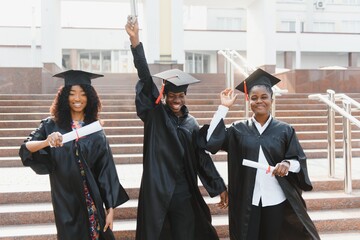 optimistic young university graduates at graduation
