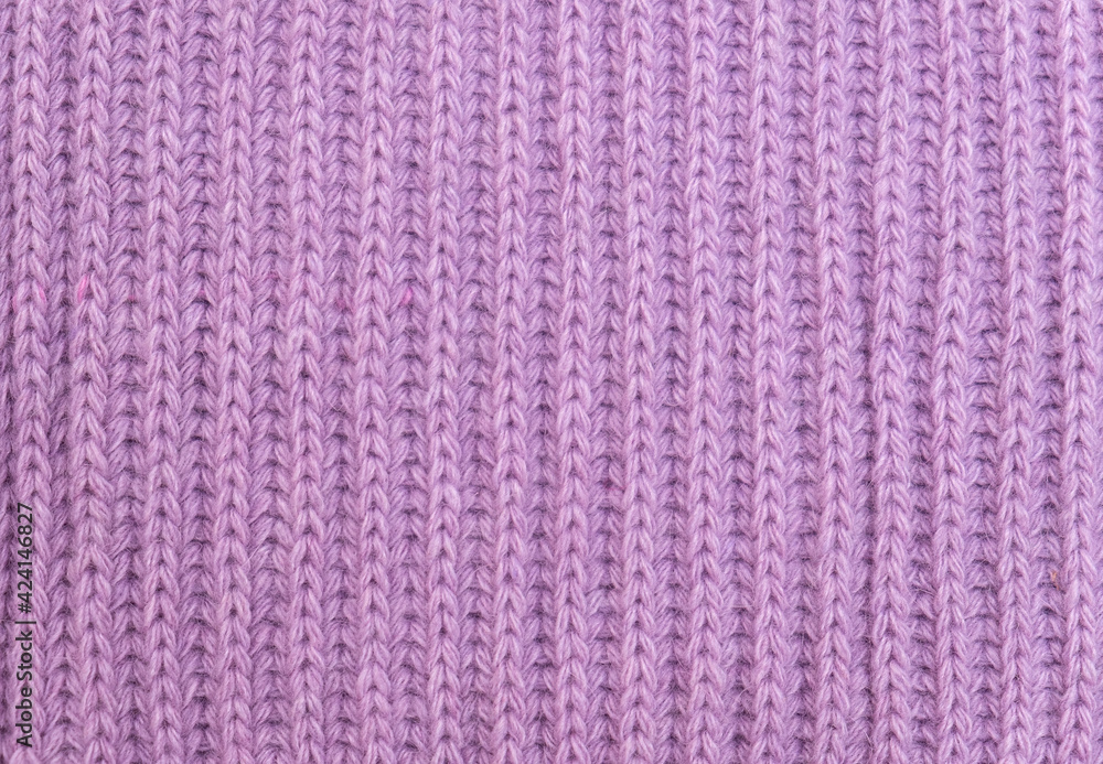 Close-up texture of knitted fabric. Knitted background Close-up texture of knitted fabric. Knitted background