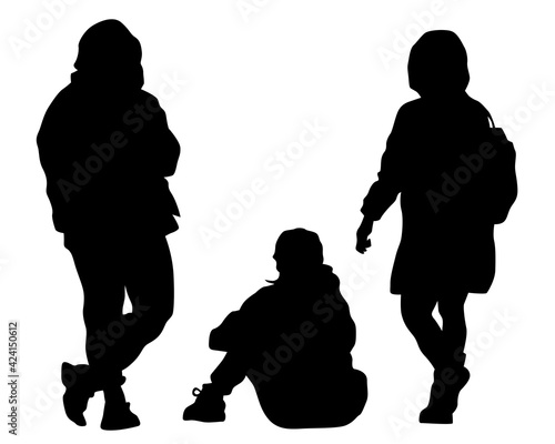 Men and women sit on the ground during a picnic. Isolated silhouettes on white background