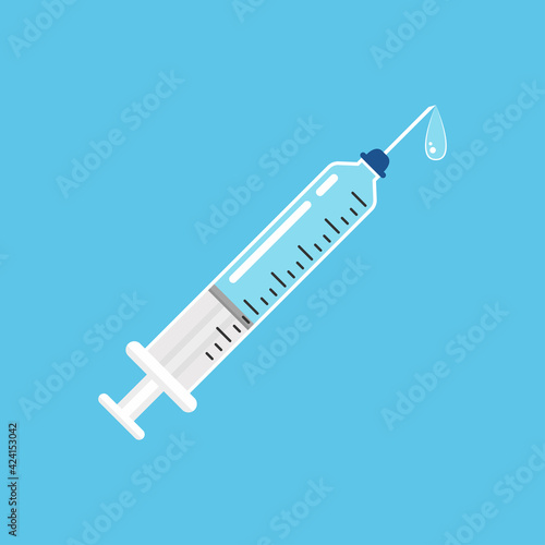 Syringe vector. Syringe on blue background.