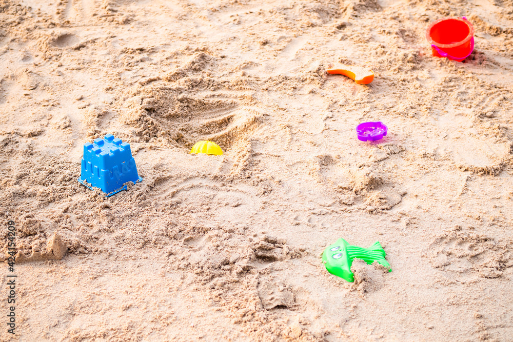 Toy on sand beach at coast for children. tourist in vacation travel summer holidays. happy family concept. Toy on sand beach at coast for children. tourist in vacation travel summer holidays. happy family concept.