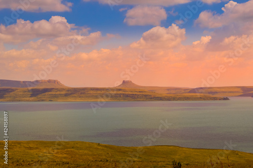 Panoramic Sterkfontein Dam and nature reserve at sunset in Drakensberg area © shams Faraz Amir