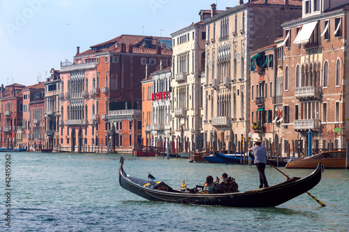 Venice. Stone facades of old houses along the Gran Canal.