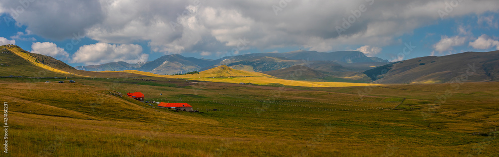 Impressive panorama view on Bucegi Plateau, in a summer day, Romania