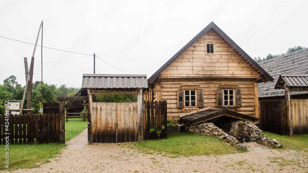 Russian Old Believers village in Latvia, Slutiski. Beautiful wooden house. Russian Old Believers village in Latvia, Slutiski. Beautiful wooden house.