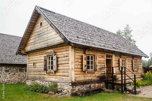 Russian Old Believers village in Latvia, Slutiski. Beautiful wooden house. © Bargais