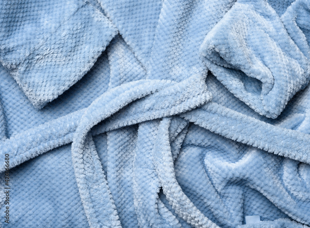 a fragment of a gray-blue plush robe with a belt a fragment of a gray-blue plush robe with a belt