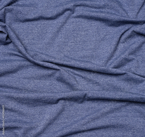 wrinkled blue cotton fabric for sewing t-shirts and clothing