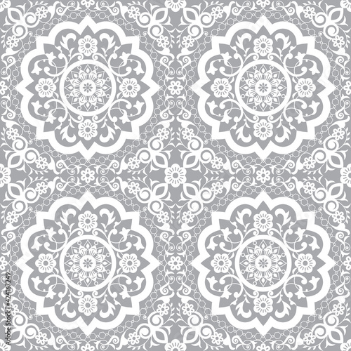 Traditional Moroccan art carved mandala inspired seamless pattern, vector arabic decor with flowers, leaves and swirls 
