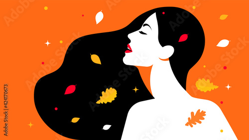 Fall of leaves - silhouette of woman under a leaf fall. Falling autumn leaves fall on the face and hair of young brunette. Concept of autumn, wind, style. Portrait of woman in modern style.