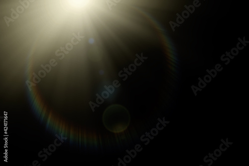 Abstract lens flare, lighting effect elements, solar energy, sun light on black background photo