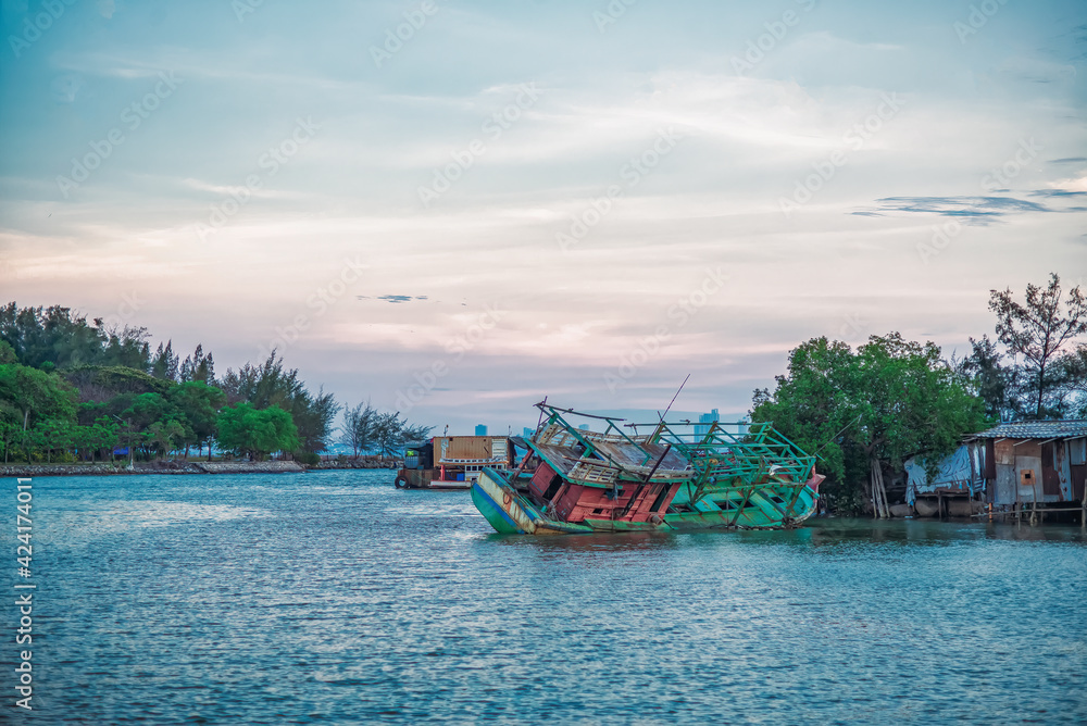 Wooden Colourful Fishing boats at rest in port, Eastern of Thailand.