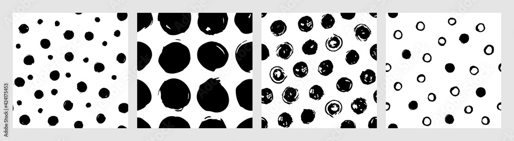 Set of ink dots vector seamless patterns. Hand drawn brush polka dots backdrop. Doodle illustration for wrapping paper and fabric. Contemporary monochrome collection with polka dots patterns Set of ink dots vector seamless patterns. Hand drawn brush polka dots backdrop. Doodle illustration for wrapping paper and fabric. Contemporary monochrome collection with polka dots patterns