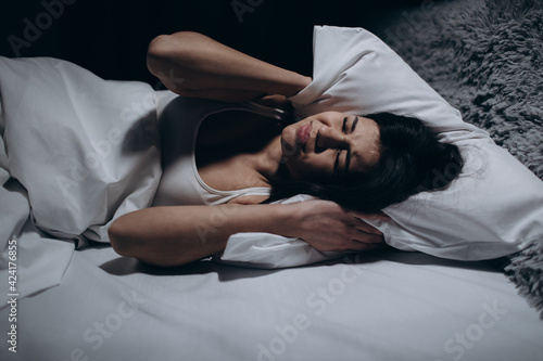 Woman can't sleep of noise