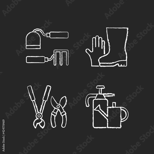 Gardening supplies chalk white icons set on black background. Hoe and fork hoes. Gloves and boots. Clippers, secateurs. Watering can. Cultivating, weeding. Isolated vector chalkboard illustrations