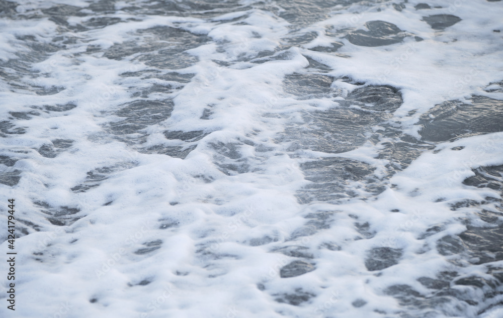 Air is cool and fresh. Minimalistic ocean background. Seascape of gently undulating sea and waves with white foam. Blue and sometimes turquoise cold North Sea. Air is cool and fresh. Minimalistic ocean background. Seascape of gently undulating sea and waves with white foam. Blue and sometimes turquoise cold North Sea.