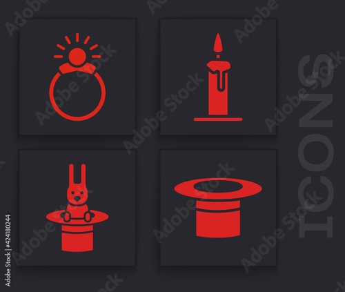 Set Magician hat, Magic stone ring with gem, Burning candle in candlestick and Magician hat and rabbit icon. Vector