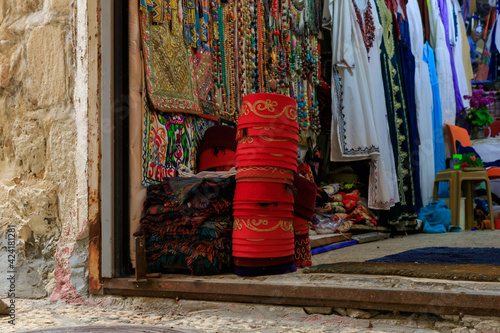 An open  shop on Daniel Street Arab market on a rainy day near the Yafo Gate in the old city of Jerusalem, in Israel © svarshik