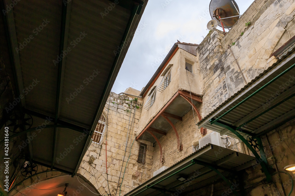 Old  buildings on a rainy day near the Yafo Gate in the old city of Jerusalem, Israel