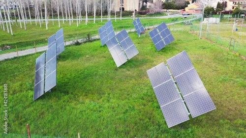 Group of modern solar panles oriented to the sun photo